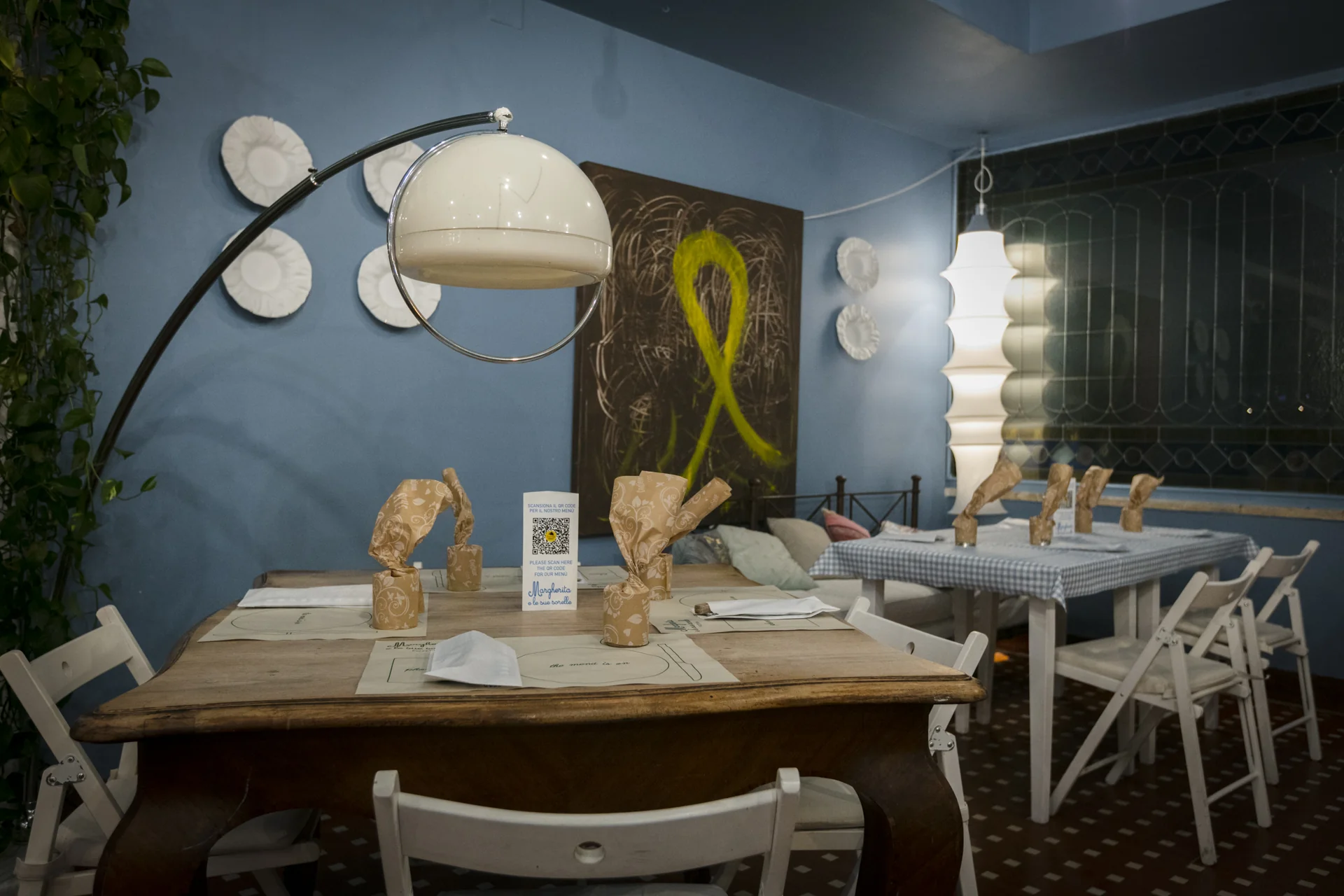 Dining room with wooden tables and blue walls